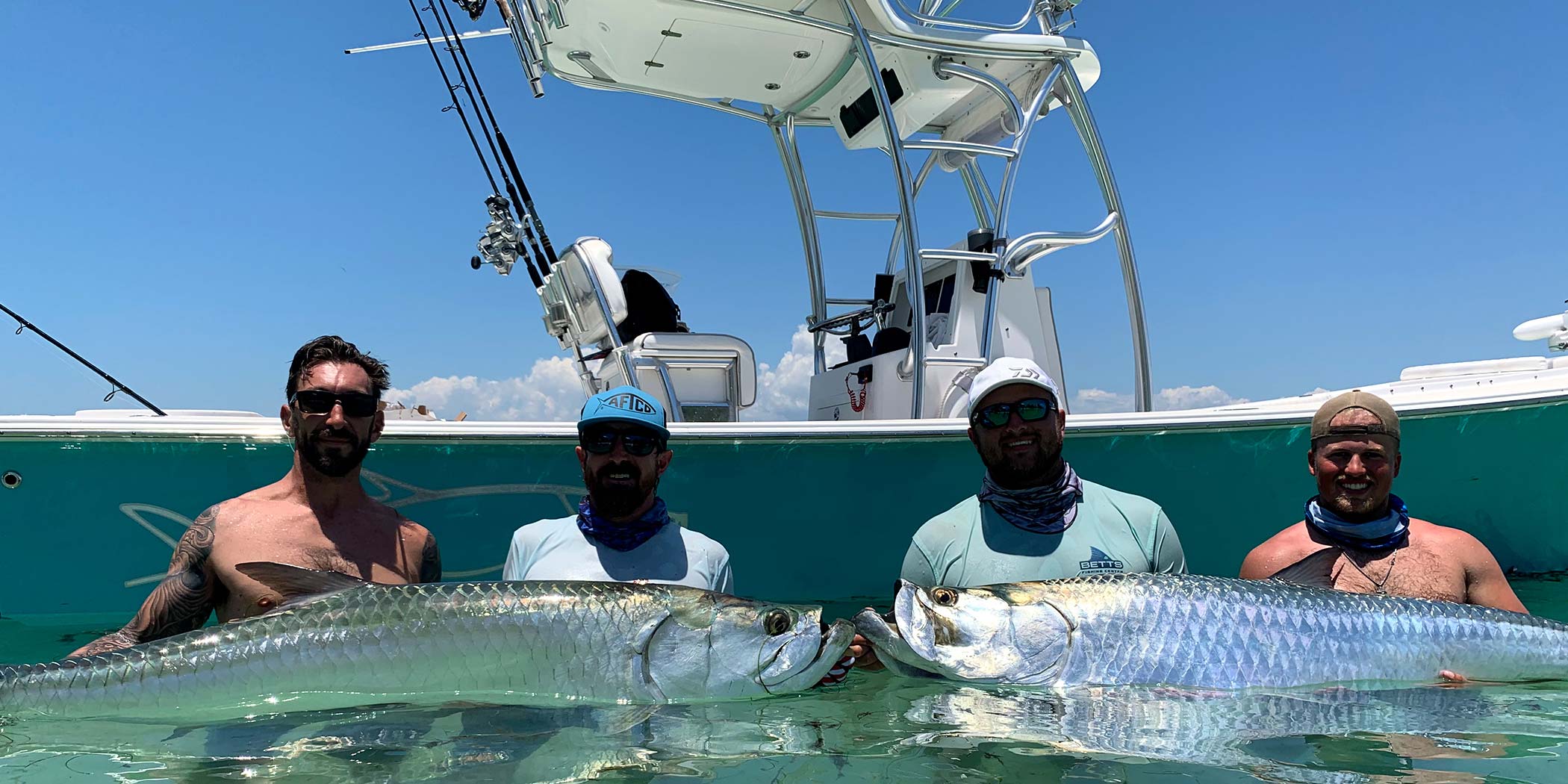 Landed a couple of monster tarpon during this charter, clients wanted to get in the water with them for the picture.