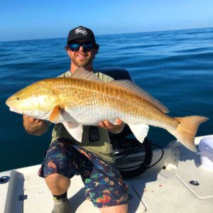 Went a bit further from the shore on a calm day to catch this impressive redfish with InshoreAction.